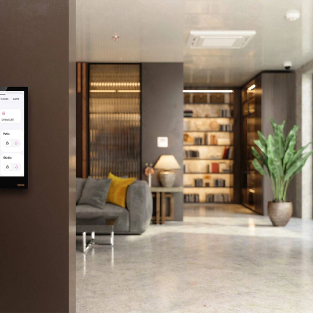 <span class="uk-h4">Wall-mounted smart home touchscreen controlling lighting, locks, and security.</span>