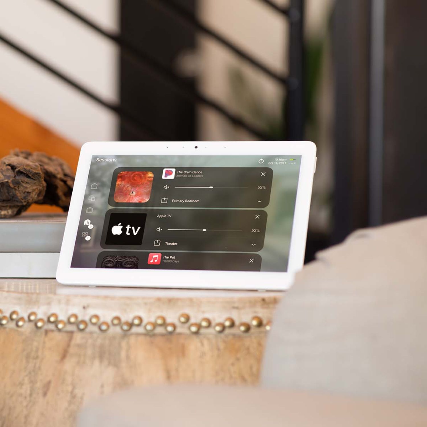 Control4 Touch Panel sitting on a pile of books